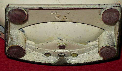 2 Cut-out 61V. Large lettering (about 2.7 mm tall). Cut-out base. 1A or 2A. 1951 to 1956. (Possibly mid-1951 to mid-1953.). Base 2, cut-out, 2A