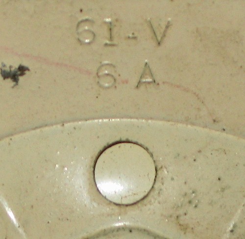 3 61-V (notice the dash) in large lettering, two radial lines on base. 5 A or 6 A cavity number.. Base 3, 6A