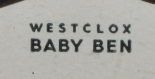 Small Westclox "Westclox" in small caps. Used from 1949 to 1952.. Dial: Small Westclox