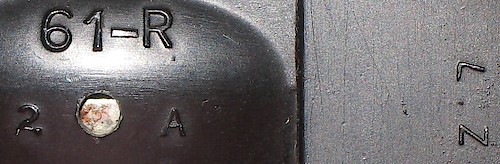 2 "Z 7" "61-R" in small lettering, "1 A" or "2 A" below it. The "1 A" base has auxiliary lettering "Z 7" on the left side, the "2 A" base has the auxiliary lettering "Z 7" on the right side. Clock tilts back on base. Used in 1944.. Base 2, Z 7, 2 A