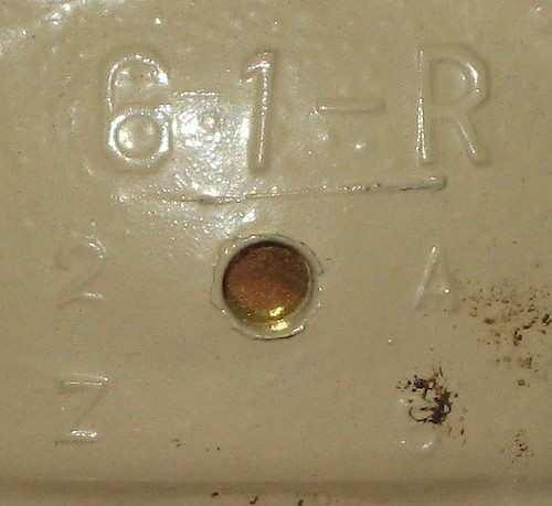 1 "Z 5" "61-R" in large lettering, "1 A" or "2 A" below it, "Z 5" below that. Used ca. 1941. Clock is upright on base.. Base 1, Z 5, 2 A
