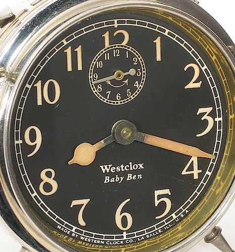 5.1 Lum Black luminous dial, Westclox Baby Ben below center, Westclox in Roman font, flat-top x. MADE BY WESTERN CLOCK CO., LA SALLE, ILL., U.S.A. at bottom. 1923 - 1927.. Dial 5.1 Lum. Richard Tjarks collection.