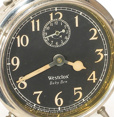 6.1 Lum Black luminous dial, Westclox Baby Ben below center, Westclox in Roman font with TAIL on the X. MADE BY WESTERN CLOCK CO., LA SALLE, ILL., U.S.A. at bottom. Starting in 1928.. Dial 6.1 Lum