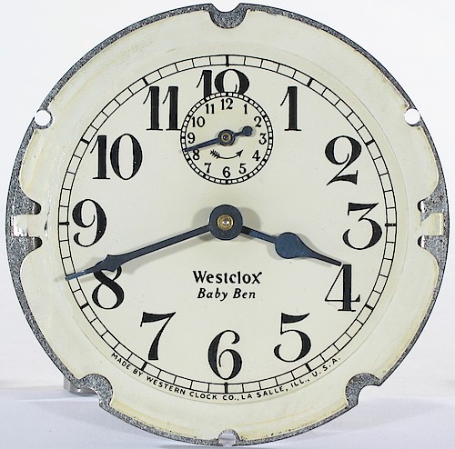 6.2 PAINTED DIAL with same lettering as 6.1. Westclox Baby Ben below center, Westclox in Roman font with TAIL on the X. MADE BY WESTERN CLOCK CO., LA SALLE, ILL., U.S.A. at bottom. Ca. 1927 to 1928. Unusual.. Dial 6.2 Cream