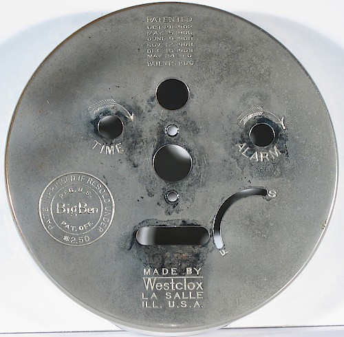1910.4 Patents through 1910 in list at top. Price $2.50 seal at left. MADE BY WESTCLOX LA SALLE ILL, U.S.A behind rear leg. No index marks on regulator. 13/11 and 17/13 feathers above winding holes. Ca. second half of 1911.. 1910.4 13/11 and 17/13 Feathers