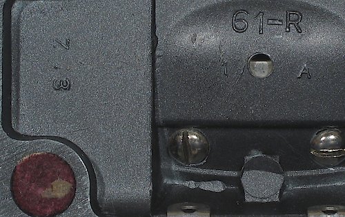 2 "Z 3 ◯" "61-R" in small lettering, "1 A" or "2 A" below it. The "1 A" base has auxiliary lettering "Z 3" on the left side, the "2 A" base has the auxiliary lettering "Z 3" on the right side. Clock tilts back on base. One extra casting dot in base, centered below the two screws. Used from 1947 until the end of production of style 5.. Base Z3 ◯ 1A