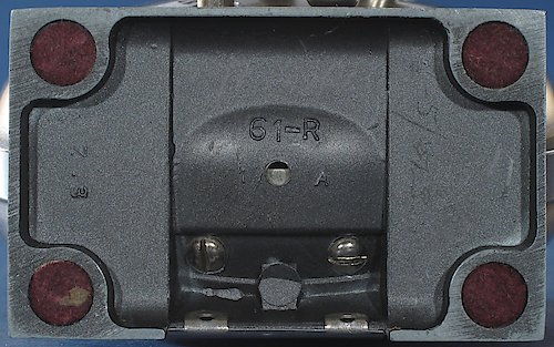 2 "Z 3 ◯" "61-R" in small lettering, "1 A" or "2 A" below it. The "1 A" base has auxiliary lettering "Z 3" on the left side, the "2 A" base has the auxiliary lettering "Z 3" on the right side. Clock tilts back on base. One extra casting dot in base, centered below the two screws. Used from 1947 until the end of production of style 5.. Base Z3 ◯ 1A