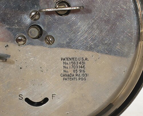 2 Three patent numbers and Canada Rd. 1931 and a sliding alarm on/off switch. Used from ca. late 1931 to late 1932.. Big 3 Back 2