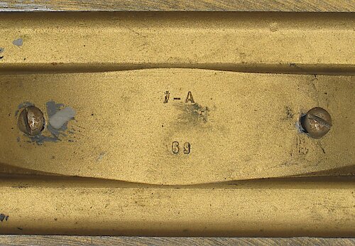 3 Base is standard depth of 1 27/32 inches. The cavity number "1-A" or "2-A" has narrow spacing. The "69" at the bottom is  right-aligned with the "1-A" or left-aligned with the "2-A". Used from ca. 
April 1935 through the end of Style 4.. Big 4 Base 3 "1-A"