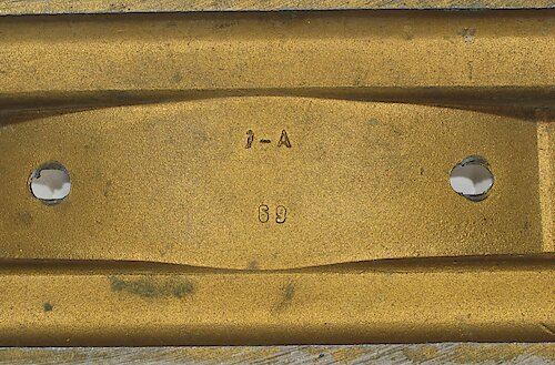 3 Base is standard depth of 1 27/32 inches. The cavity number "1-A" or "2-A" has narrow spacing. The "69" at the bottom is  right-aligned with the "1-A" or left-aligned with the "2-A". Used from ca. 
April 1935 through the end of Style 4.. Big 4 Base 3 "1-A"