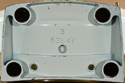 Metal 1 Metal base with number "53647" and a single digit cavity number. Thin numbers. I need more data to find how long it was used. This base came first.. Metal Base 1 "3"