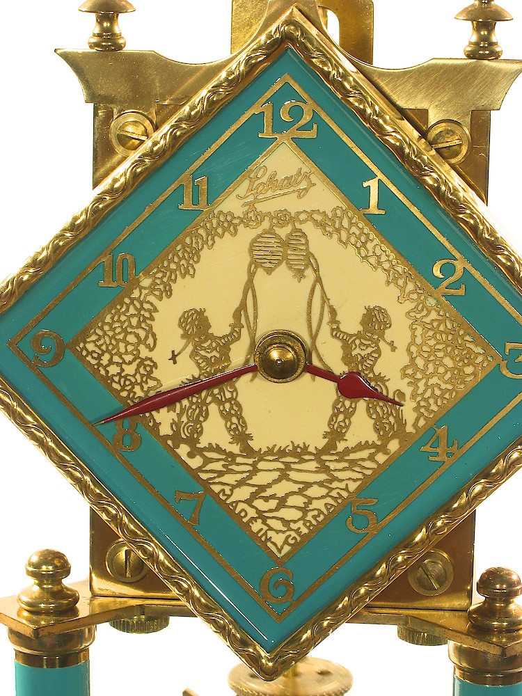 Schatz Standard 400 Day Turquoise Diamond Dial Japanese Lantern Image. Picture in the center of the dial. Picture is a fanciful representation of two people lighting Janapese lanterns.