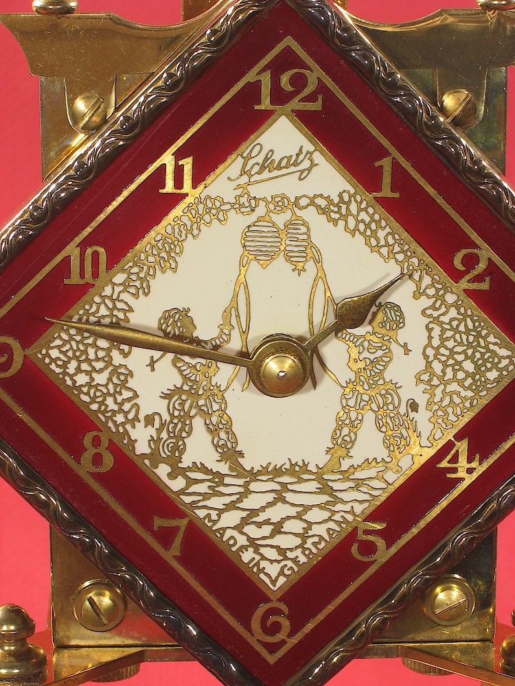 Schatz Standard 400 Day Maroon Diamond Dial Japanese Lantern Image. Picture in the center of the dial. Picture is a fanciful representation of two people lighting Janapese lanterns.