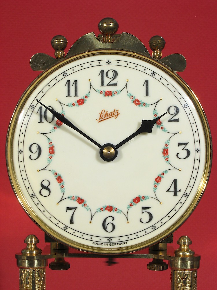 Schatz Standard 400 Day Gufa Style Plates Finials Pendulum. The dial has the Schatz trademark, and says Made in Germany at the bottom. This is the usual type of dial.