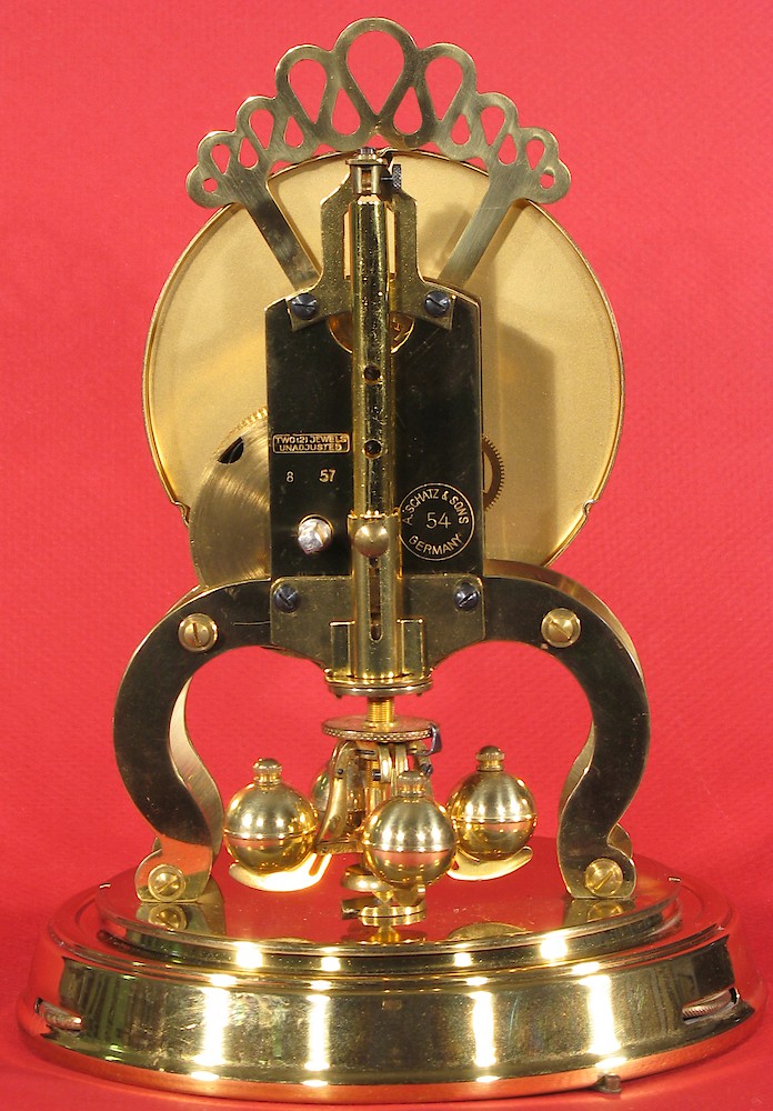 Schatz 1000 Day Round. Back view, showing the 8 57 date stamp, and the model number 54 in the circle.