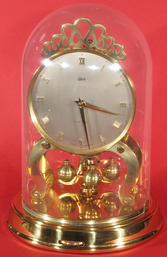 Schatz 1000 Day Round. Complete clock with the original  plastic dome.