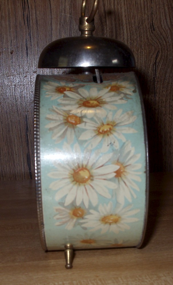 Westclox Daisy Enameled Alarm. "Daisy" pattern painted on the  body of the clock case.