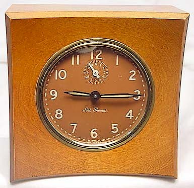 Seth Thomas Cort Maple Case Brown Luminous Dial. Cort wood cased alarm clock by Seth Thomas. Says "Made In U.S.A." at the bottom of the dial. The movement is dated December 1951. Photos courtesy of Jim Thompson.