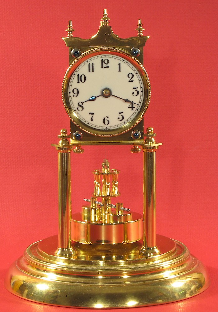 Jahresuhrenfabrik Small Disc Pendulum 400 Day Clock. Jahresuhrenfabrik Small Disc Pendulum 400 Day Clock Shelf Clock Model Photo