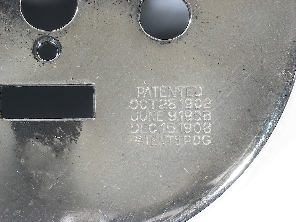 Westclox Big Face Baby Ben Style 1 Prototype. Patent Dates on back Patent dates Oct. 28, 1902; June 9, 1908; Dec. 15, 1908

The square rear leg hole was used though April 1917 on the Baby Ben alarm clock.