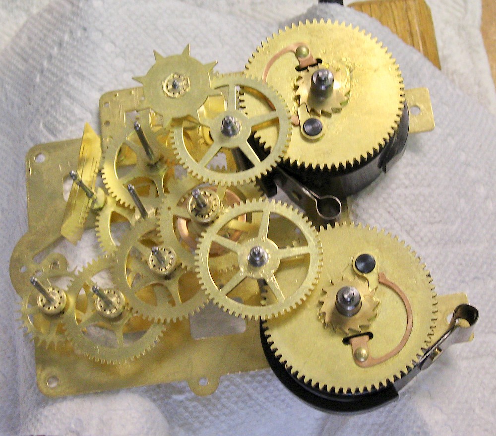 Plymouth Round Top Veneer Panel. Gears installed in front plate for assembly.