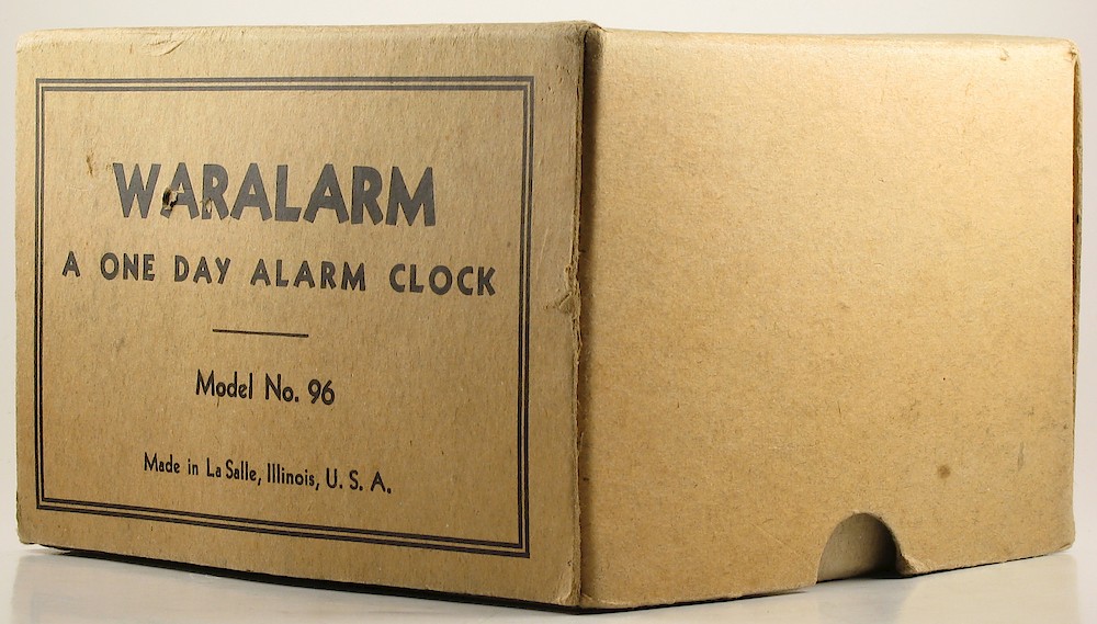 Westclox Waralarm Ivory Metal Case. Box oblique 1