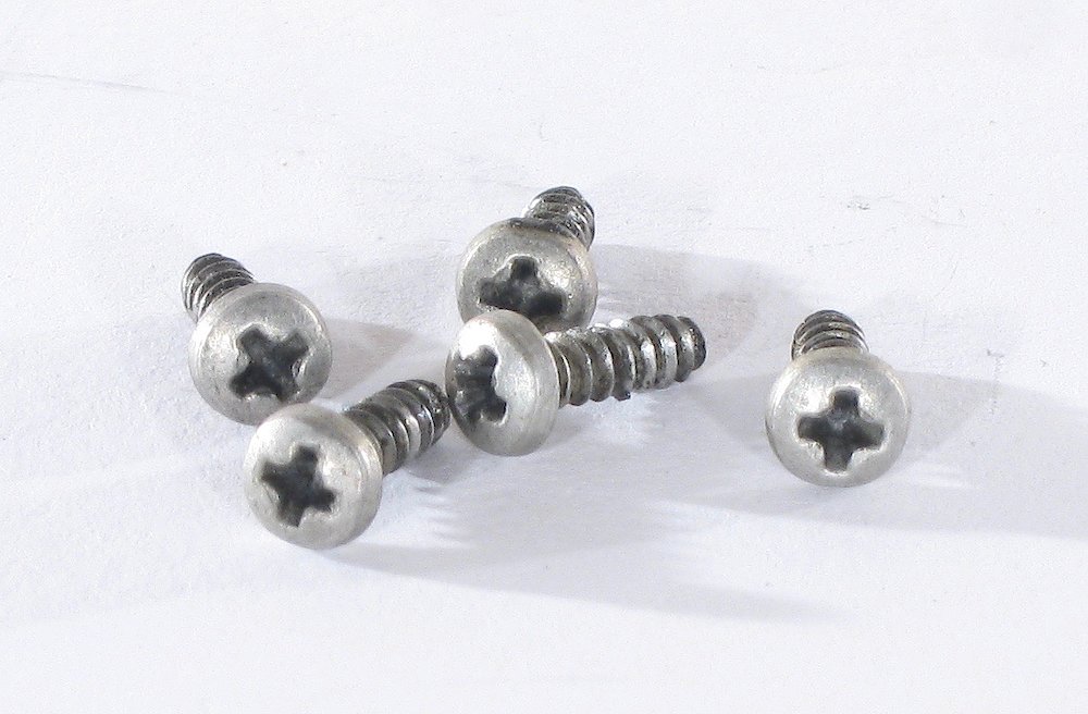 Telechron 101. Non-original Phillips head screws for motor cover