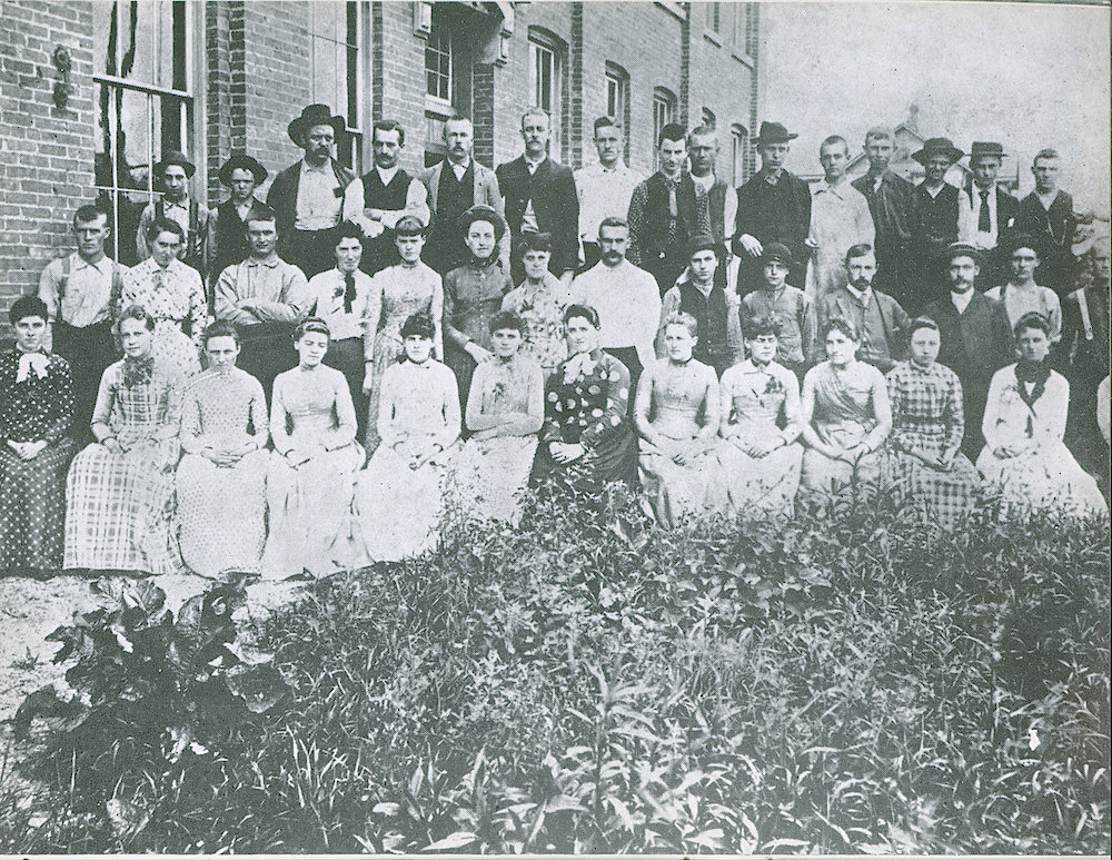 Westclox Tick Talk, August 1942, Vol. 27 No. 8 > 16. Historical Picture: Group Photo Of Employees Taken In 1885 Shortly After The Plant Was Started. See Page 17 For An Employee List.