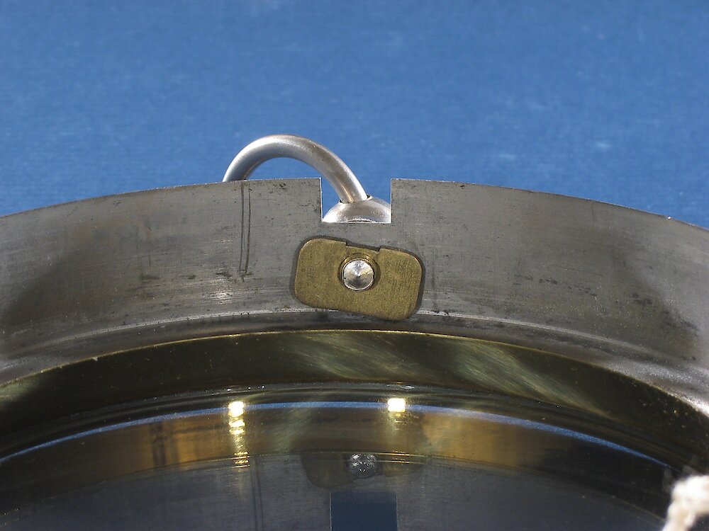 Westclox Bingo Style 1. Case clamp - older pictures show long steel clamp!