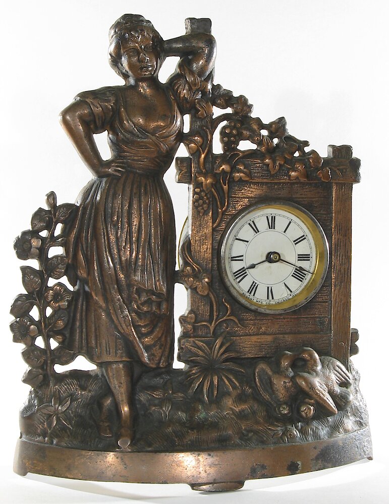 Regent Flower Girl Cast Front. Regent Flower Girl Cast Front Clock Example Photo