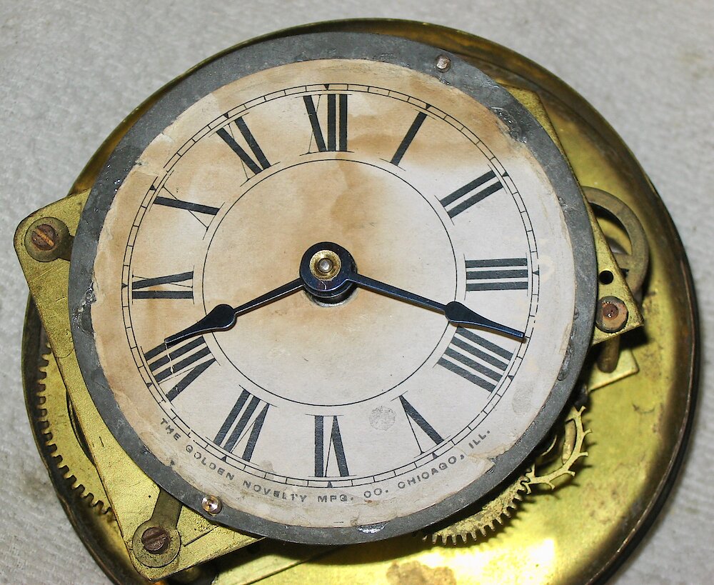 Golden Novelty Columbus Cast Front. Golden Novelty Columbus Cast Front Clock Example Photo