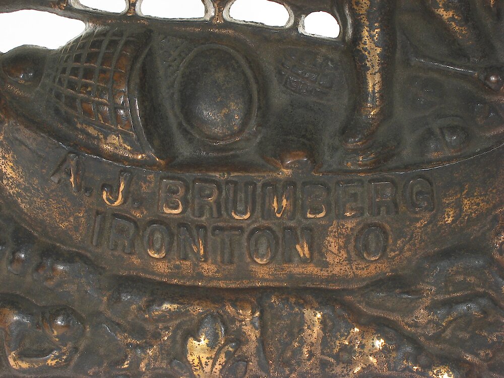 Golden Novelty Columbus Cast Front. A. J. BRUMBERG IRONTON O