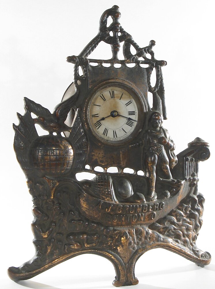 Golden Novelty Columbus Cast Front. Golden Novelty Columbus Cast Front Clock Example Photo