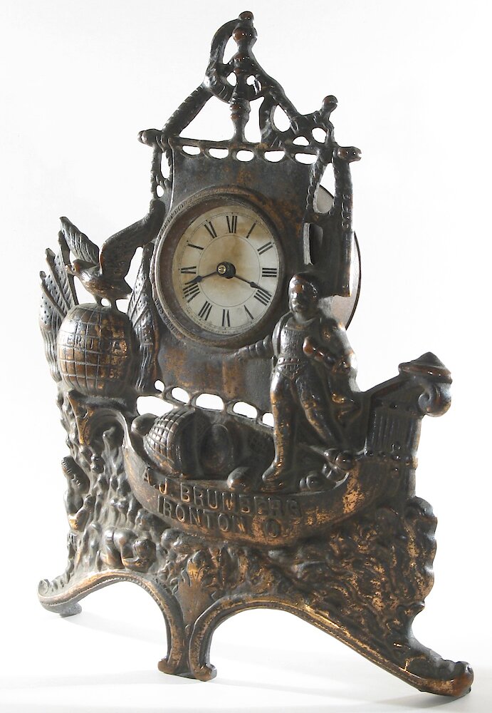 Golden Novelty Columbus Cast Front. Golden Novelty Columbus Cast Front Clock Example Photo