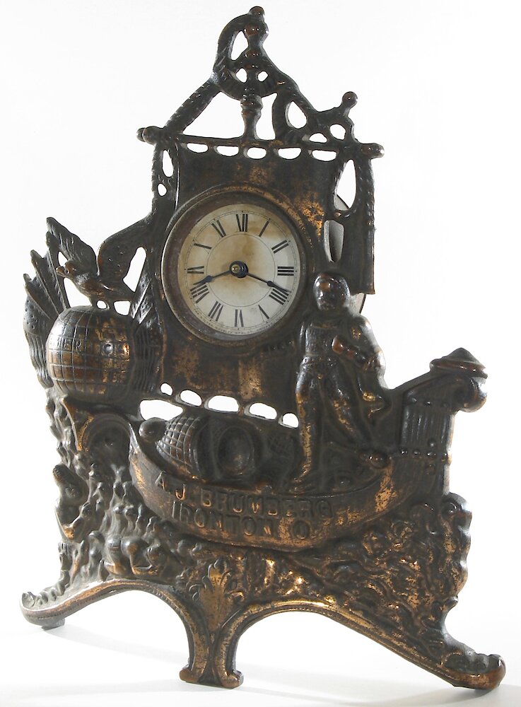 Golden Novelty Columbus Cast Front. Golden Novelty Columbus Cast Front Clock Example Photo