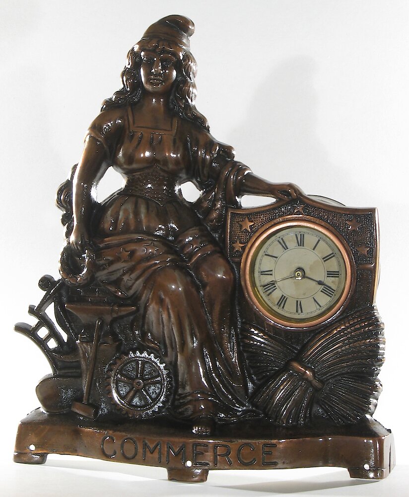 Golden Novelty Commerce Cast Front. Golden Novelty Commerce Cast Front Clock Example Photo