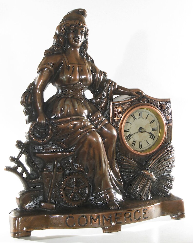 Golden Novelty Commerce Cast Front. Golden Novelty Commerce Cast Front Clock Example Photo