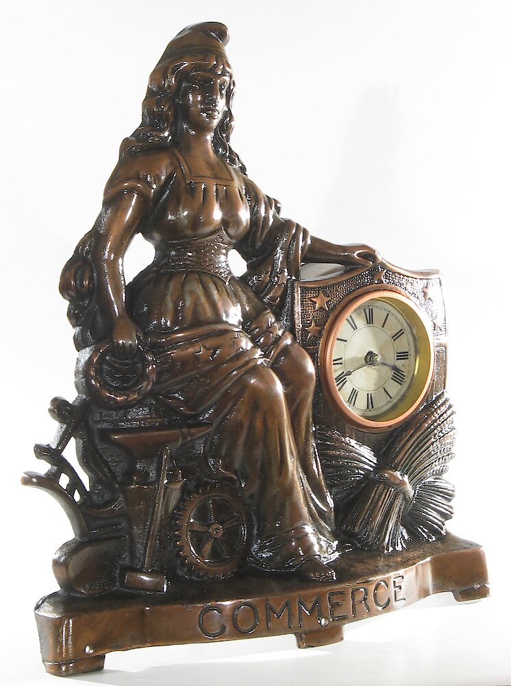 Golden Novelty Commerce Cast Front. Golden Novelty Commerce Cast Front Clock Example Photo