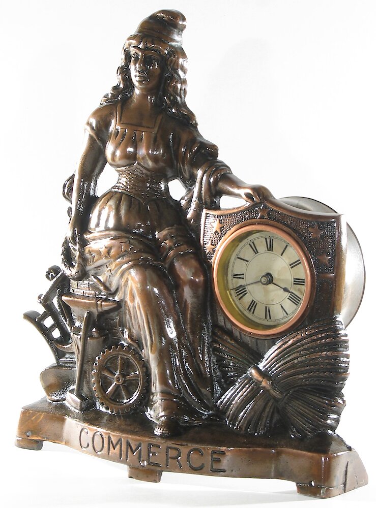 Golden Novelty Commerce Cast Front. Golden Novelty Commerce Cast Front Clock Example Photo