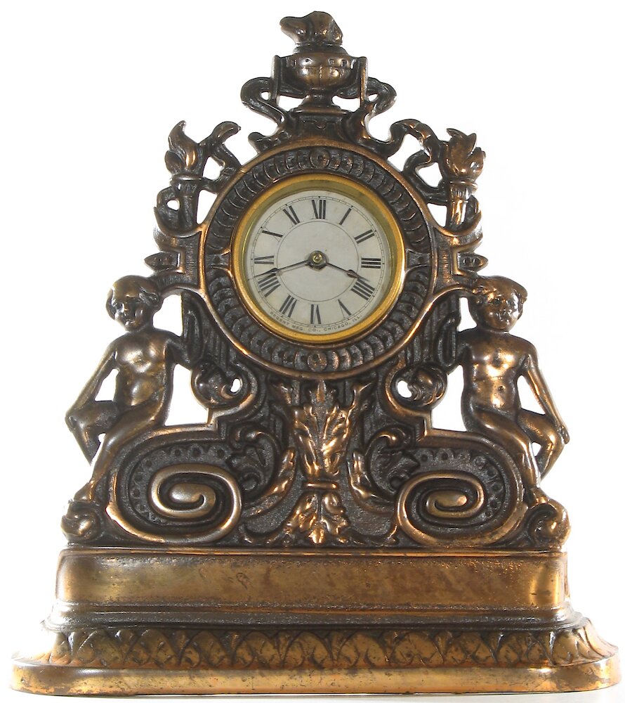 Regent Children And Scrollwork Cast Front. Regent Children And Scrollwork Cast Front Clock Example Photo