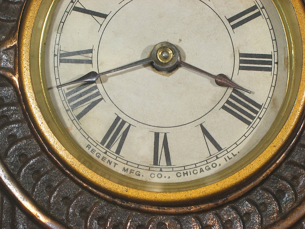 Regent Children And Scrollwork Cast Front. Regent Children And Scrollwork Cast Front Clock Example Photo