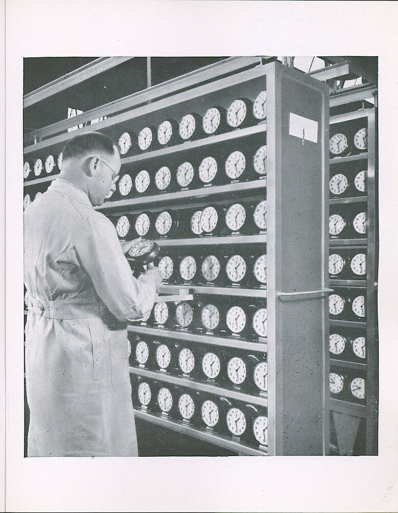 Westclox Tick Talk, October 1941 (Factory Edition), Vol. 26 No. 9 > 15. Picture: Carter Weisheit, Foreman Of The Big Ben Finishing, In Front Of A Big Ben Testing Rack. Every Big Ben Must Take His Place On The Rack. See Article/caption On Page 14.