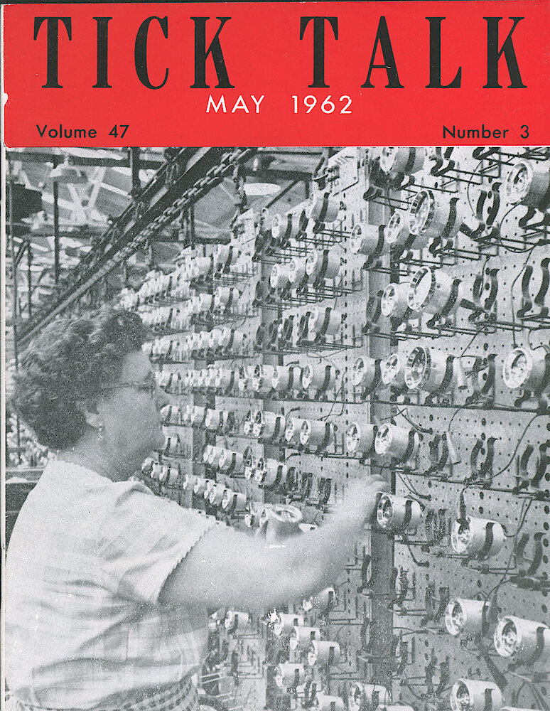 Westclox Tick Talk May 1962, Vol. 47 No. 3 > F. Manufacturing: "The Lady On The Cover Is Mary Proffit. She Is Removing Auto Clocks From The Conveyor In The Timing Racks". Caption On Page 1.