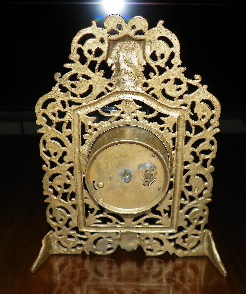 Bacchus Scrollwork Cast Front. Bacchus Scrollwork Cast Front Clock Example Photo