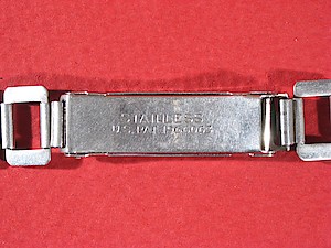 Westclox Wrist Ben Style 2 Wrist Watch. Back of buckle. STAINLESS

U.S. PAT 1966063

Issued to Charles A. Domler, Providence, R. I., assignor to The Hadley Company, Providence, R.I., a corporation of Rhode Island

Application February 18, 1931, Serial Number 515,620.

Patented July 10, 1934, 1,966,063