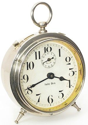 Westclox Baby Ben Style 1 Alarm Clock. Paper dial, lower case "b" in "baby": 1914 - 1915.

Compare the numeral 4 to that in the above dial. Notice that the back of the 4 is straight and thin.