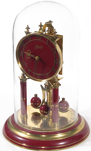 Schatz Standard Maroon Painted 400 Day Clock Solid Color Dial. This Schatz standard windup 400 day (anniversary) clock was made in November, 1952. It has an unusual maroon color dial and trim.