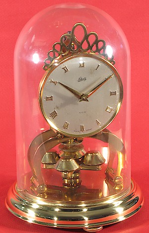 Schatz Miniature 400 Day Round Plastic Dome. Schatz miniature 400 day clock dated 5 56 (May 1956) on the movement.