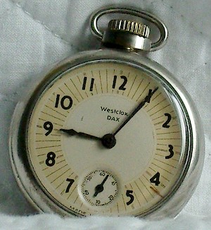 Westclox Dax Style 2 Pocket Watch. Dax style 2, solid numerals, short pendent.. Courtesy eBay seller josephj2983.