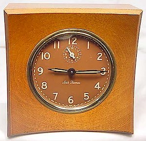 Seth Thomas Cort Maple Case Brown Luminous Dial. Cort wood cased alarm clock by Seth Thomas. Says "Made In U.S.A." at the bottom of the dial. The movement is dated December 1951. Photos courtesy of Jim Thompson.